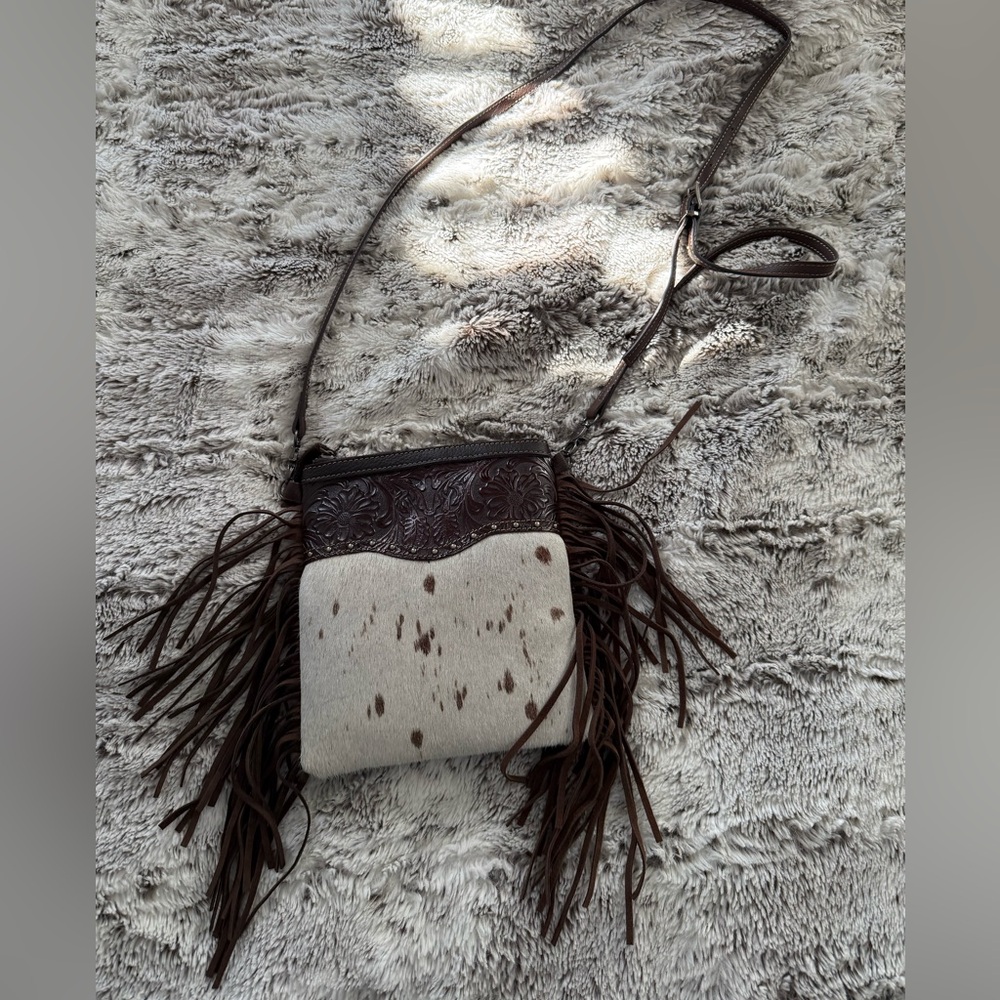 NWOT Cowhide genuine leather fringe crossbody